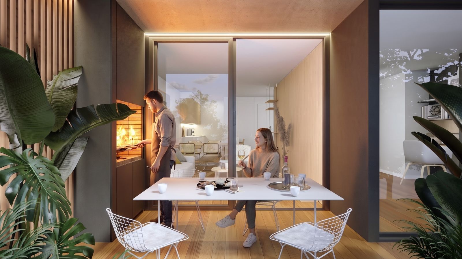 El balcón con una pareja compartiendo la mesa